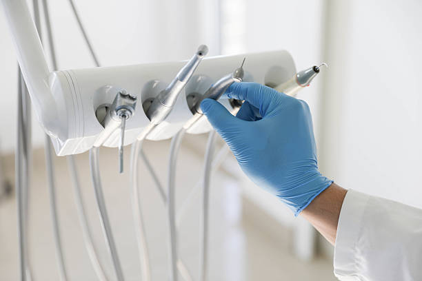 Professional Tooth Extraction technician working in Hightstown, NJ